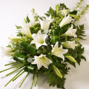 Simple but elegant, white lilies with choice foliages.